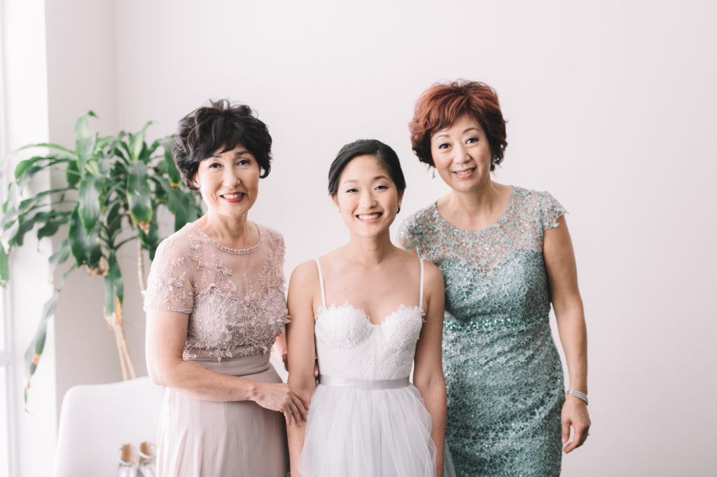 Family photo of bride with mothers