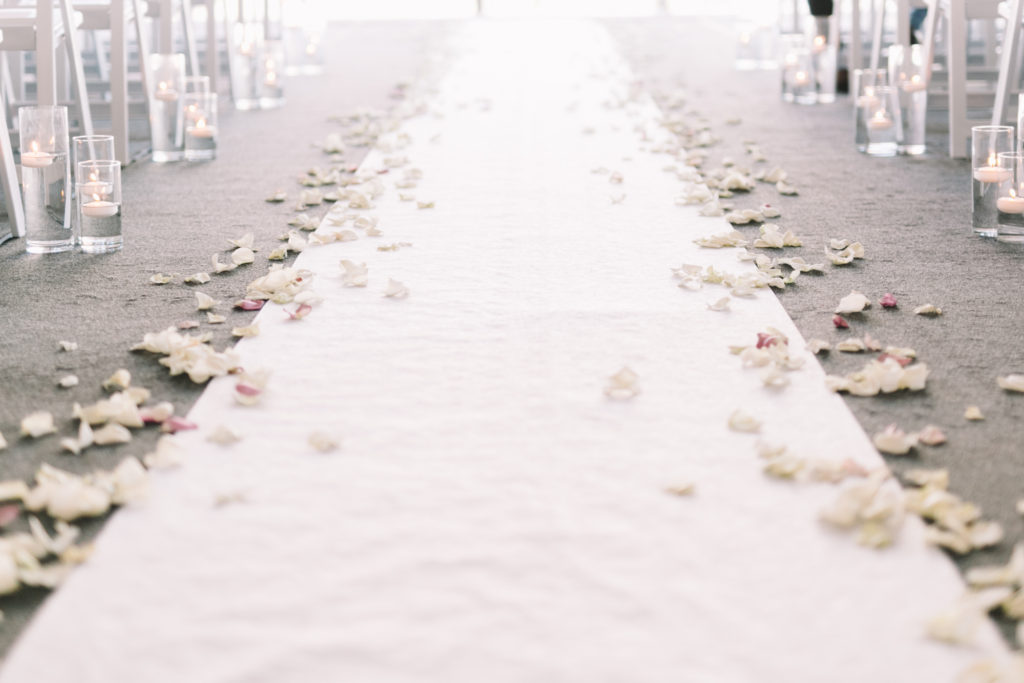 Ceremony detail photos with rose pedals