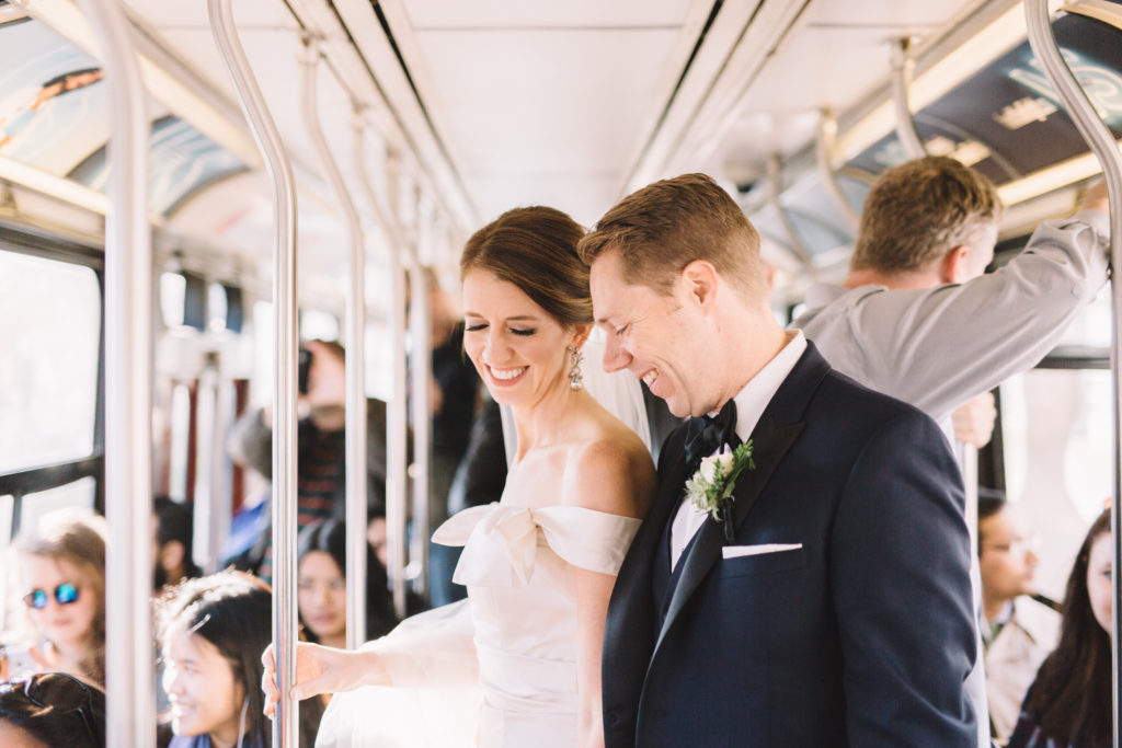 Bride and groom on Toronto Street car