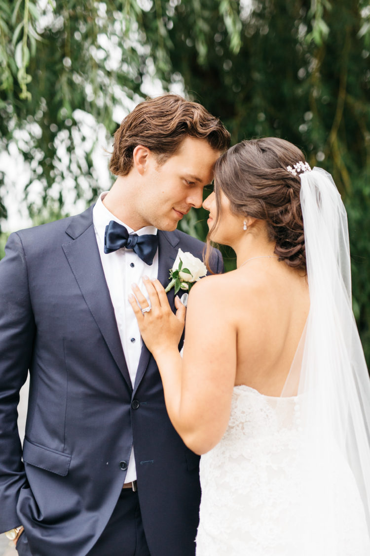 Bride and groom cuddling