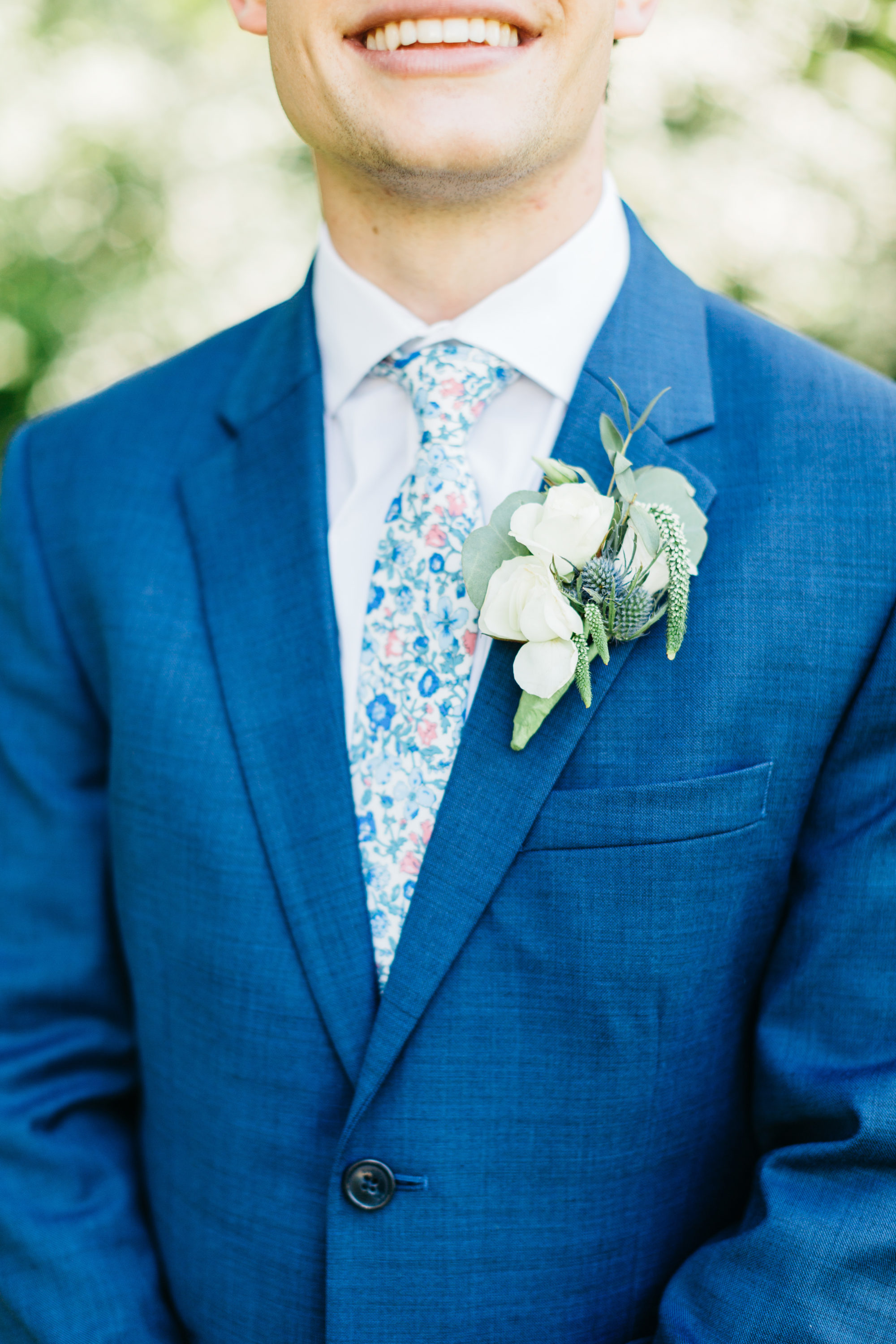 Groom boutonniere detail photo