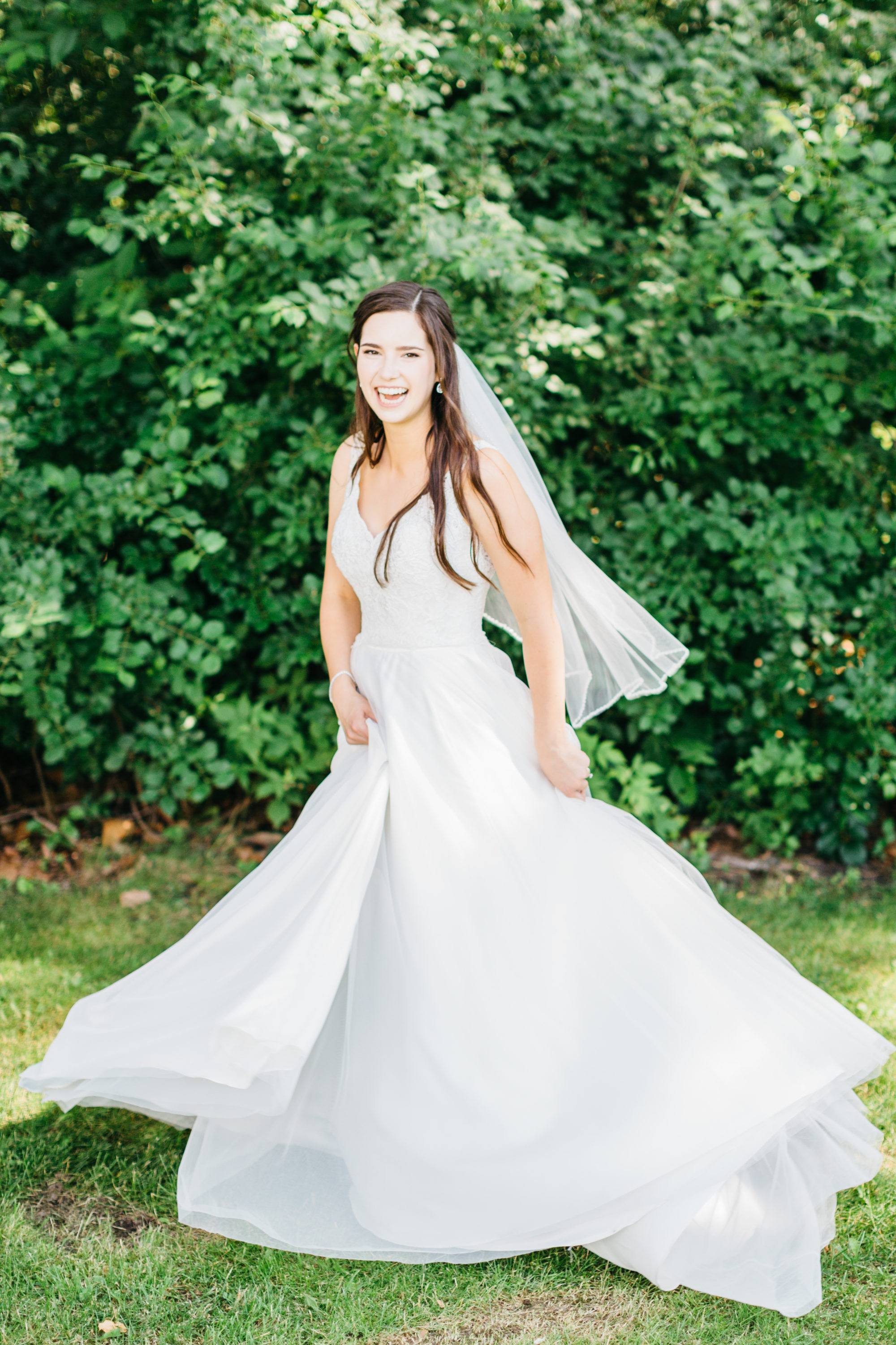 Bride swirling in her dress