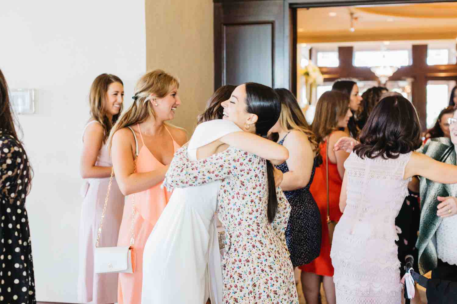 Guests mingling during Bridal shower at Eagles Nest Golf Club in Vaughan