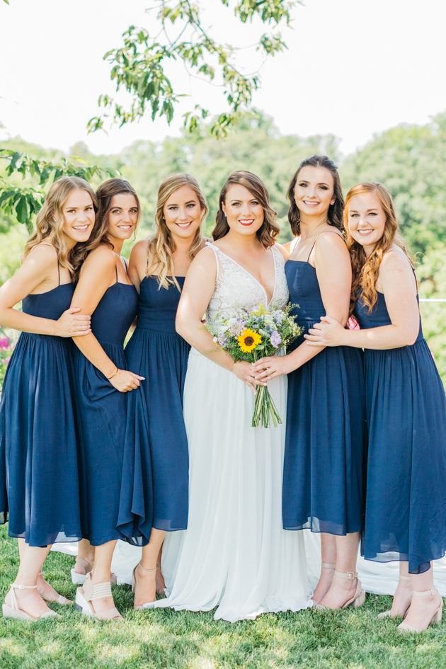 First look with bridesmaids at Stonewall Estates