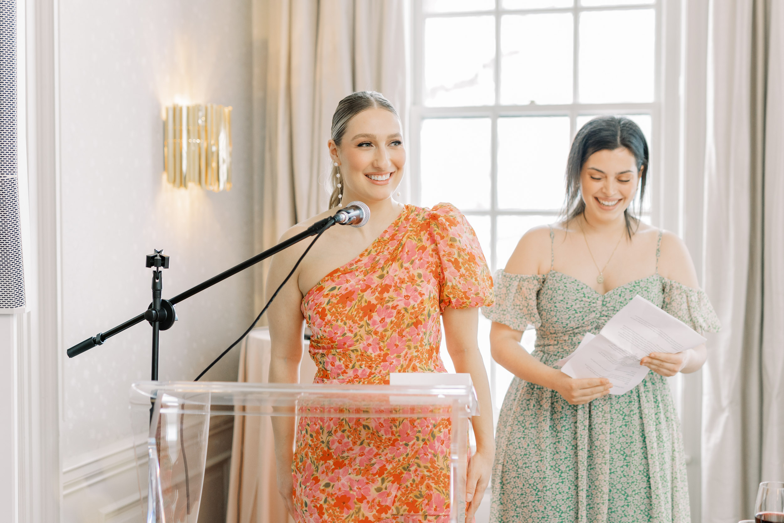 bridesmaids giving speech at bridal shower
