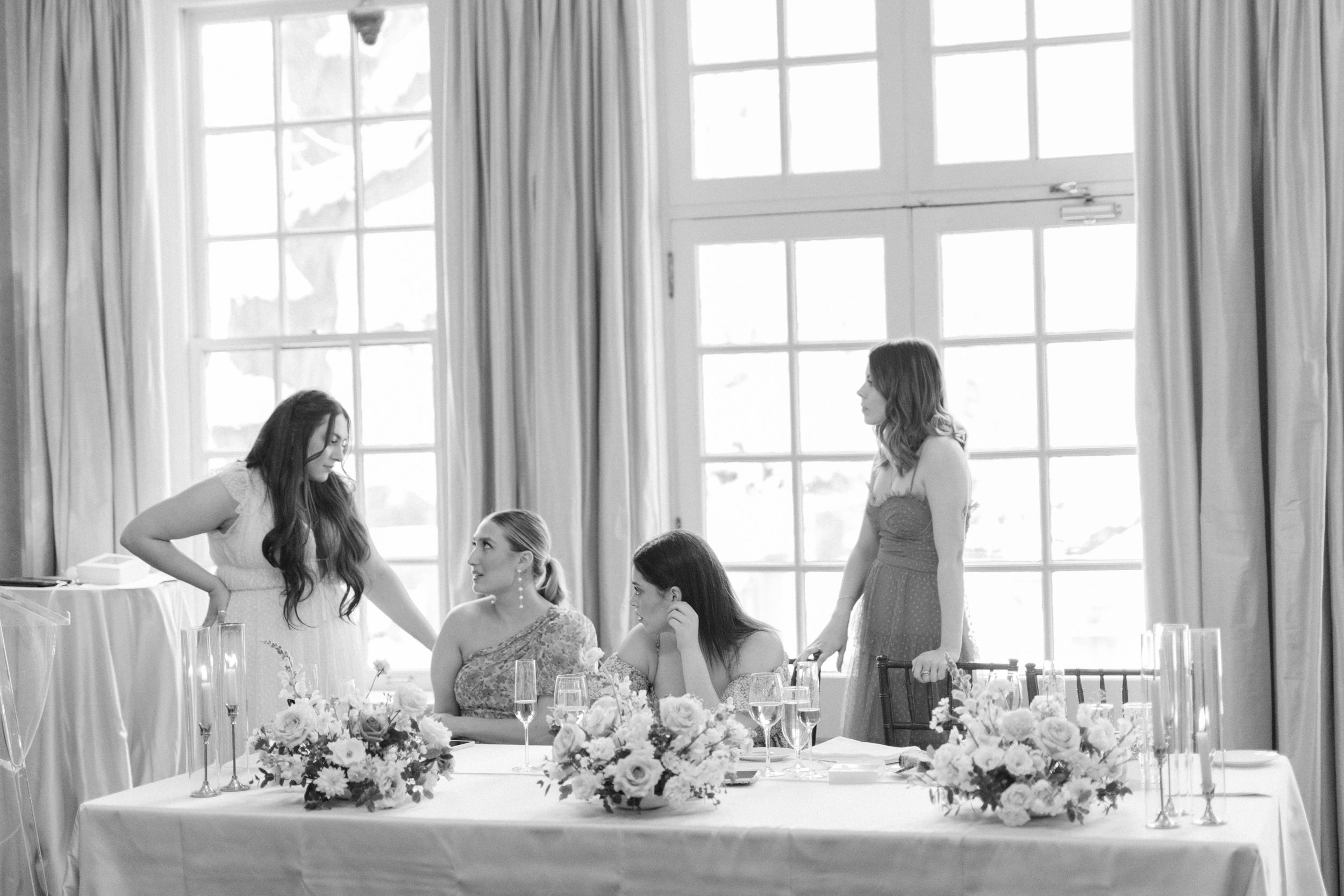 Bride and bridesmaids chatting