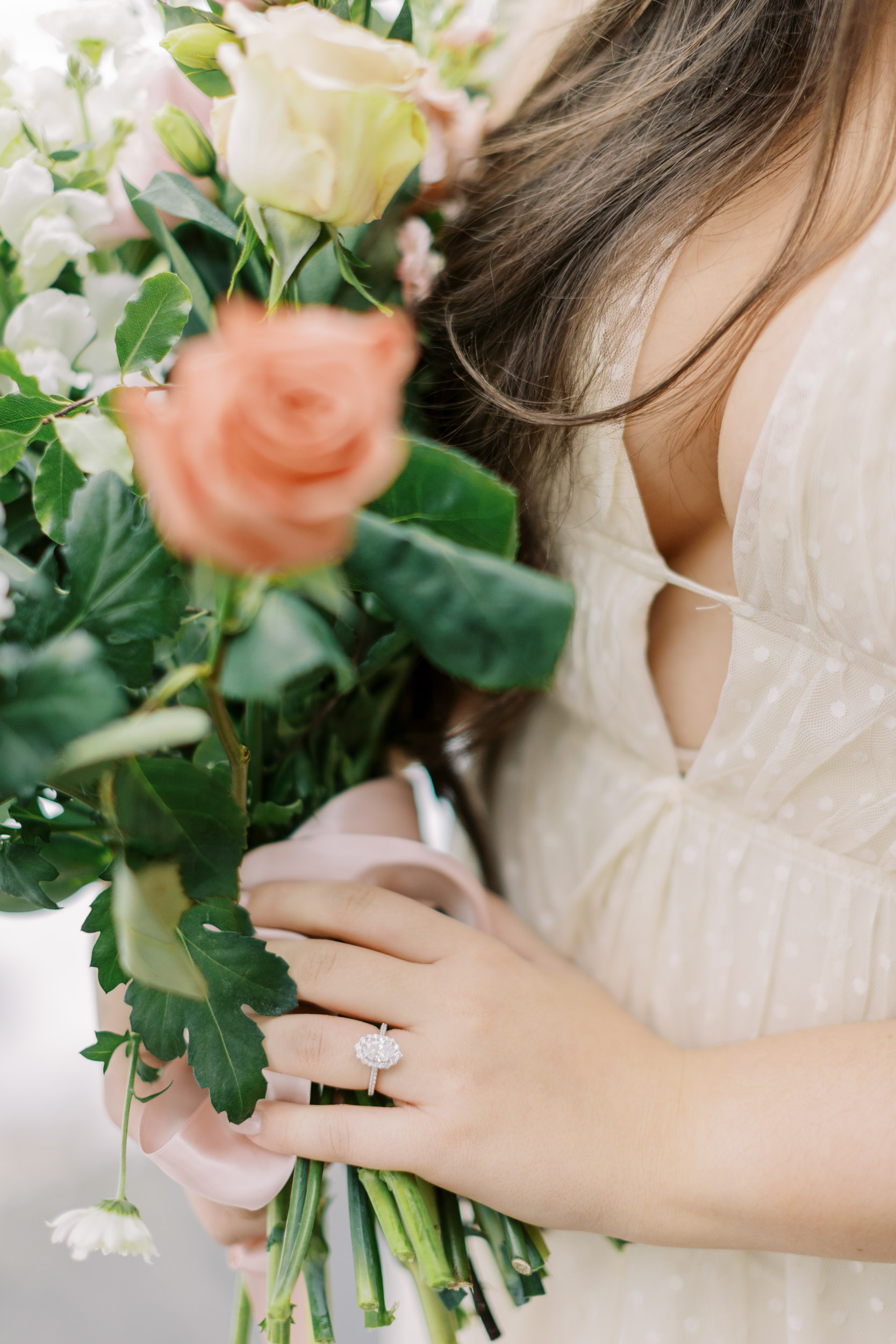 Bride holding floral bouquet