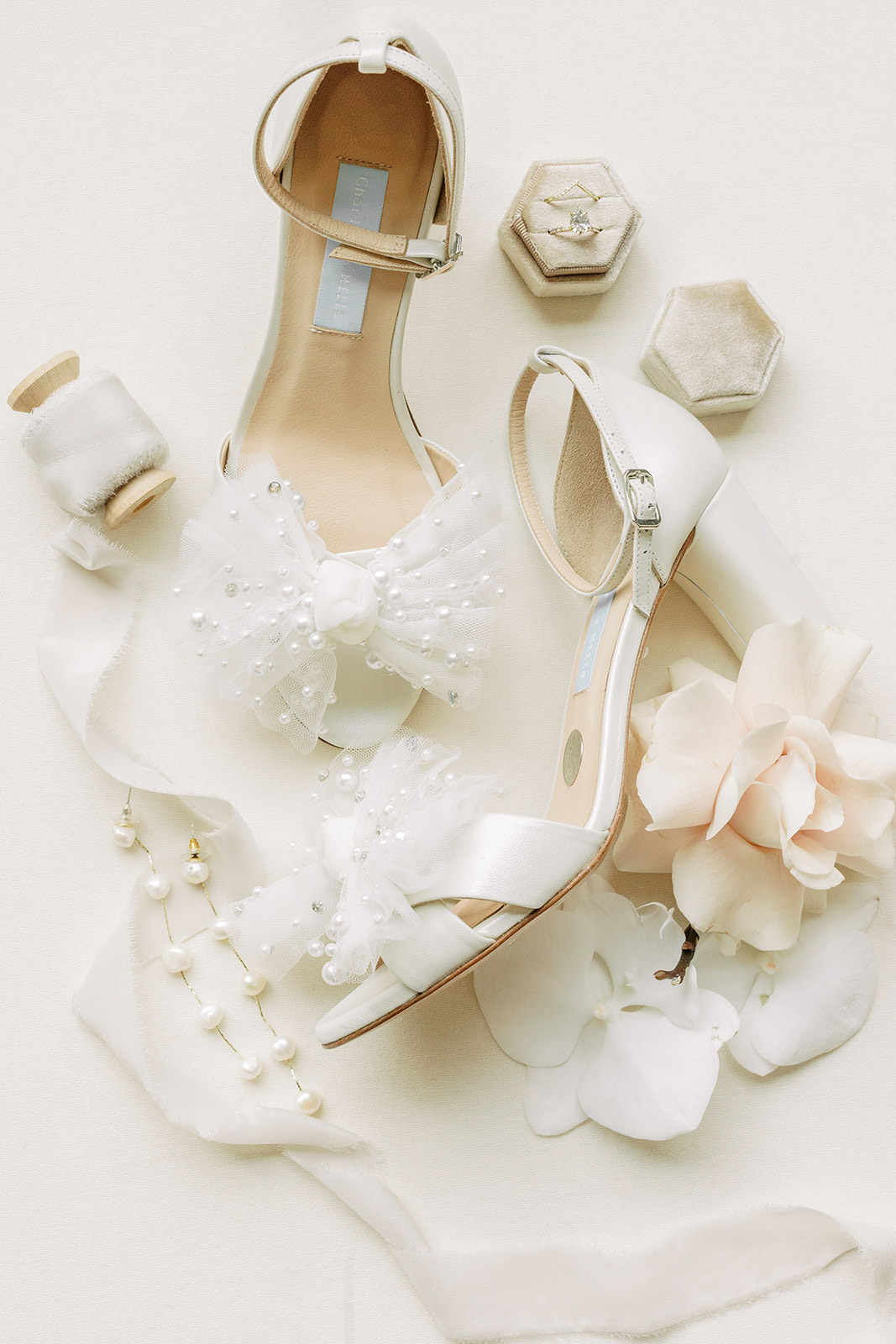 Bridal shoes and florals for flat lay detail photos for Elora Mill Wedding Editorial featured in Wedding Chicks