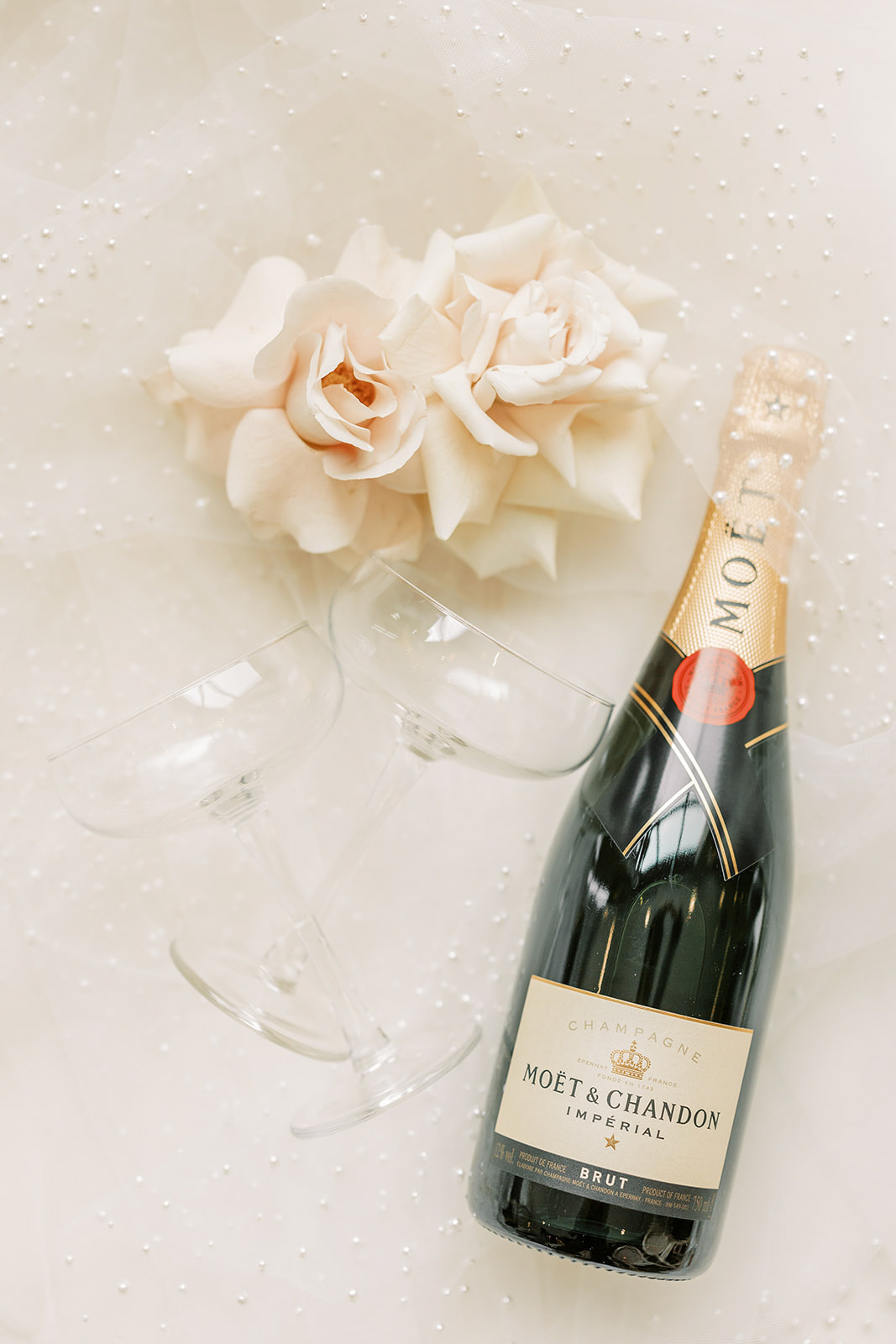 Wedding details of champagne and Moet bottle