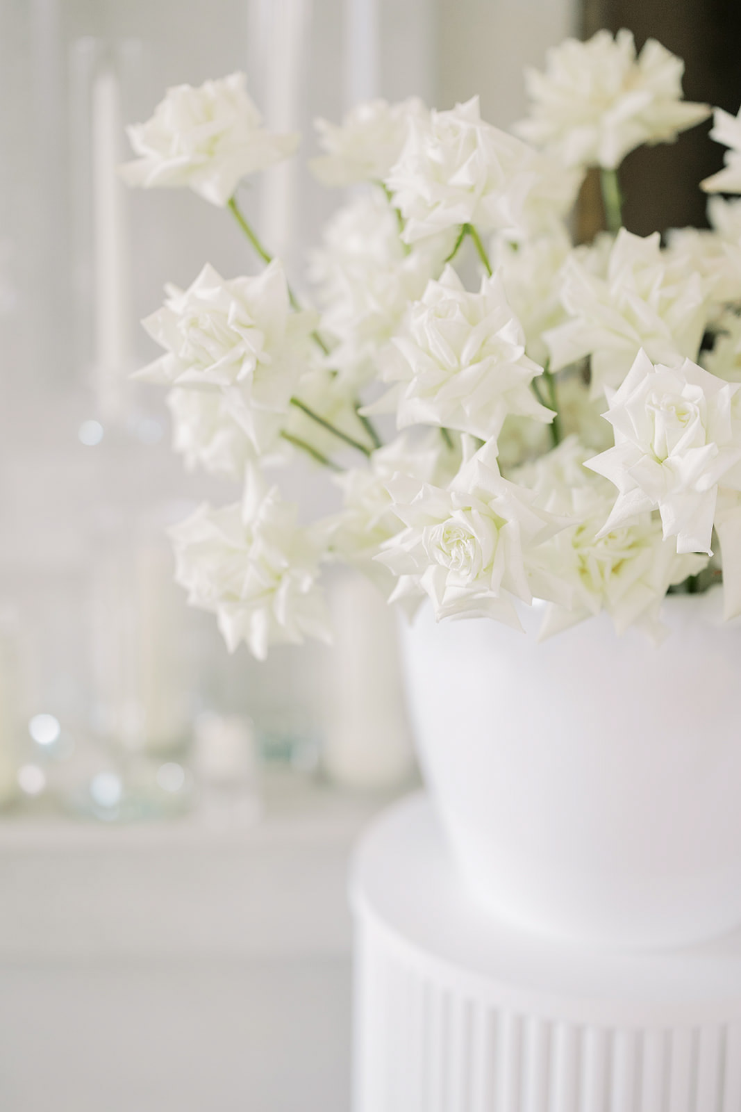 Detail photos of modern white floral arrangement for Elora Mill Wedding Editorial