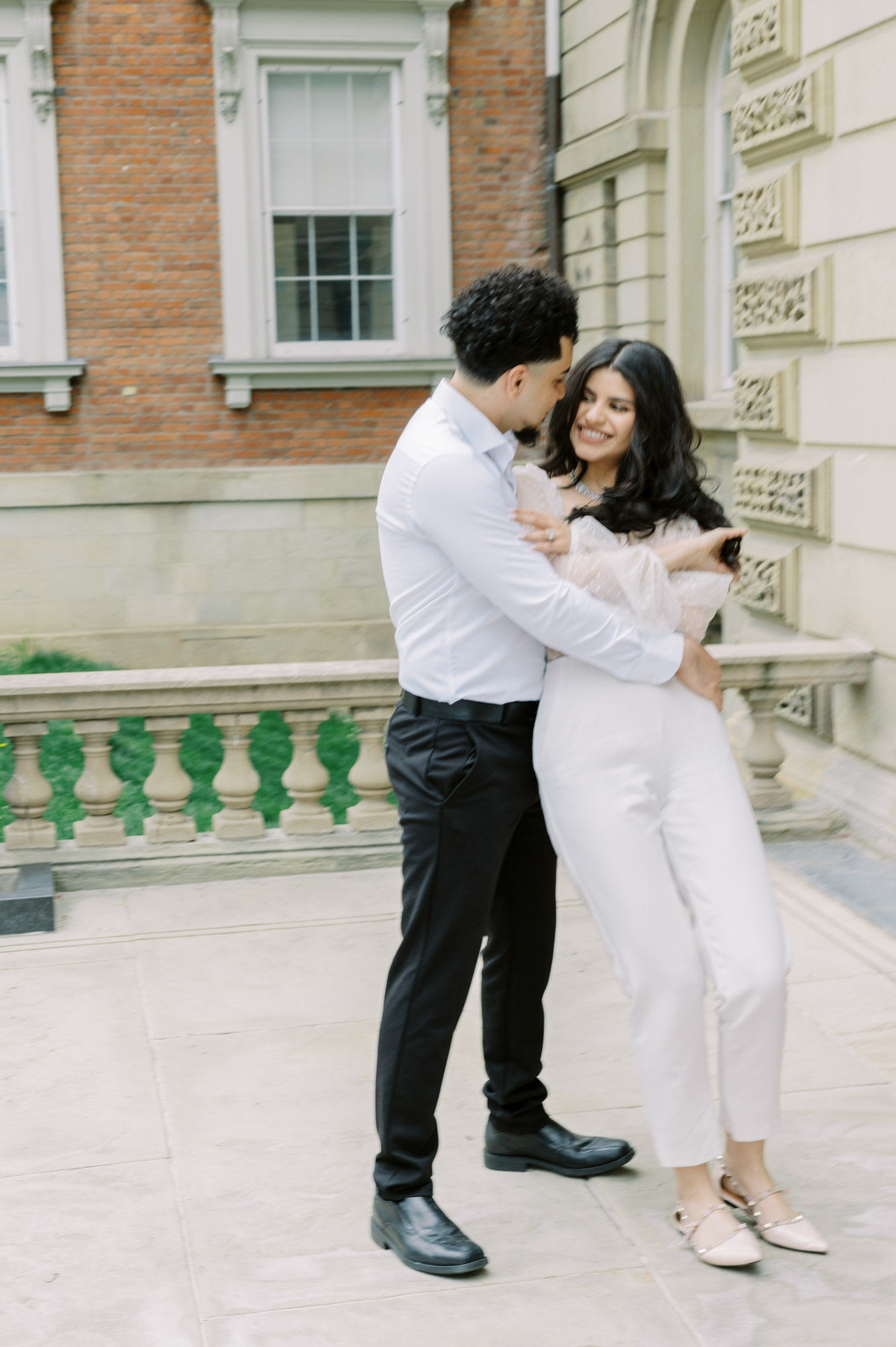Couple dancing at European nspired Engagement session at Osgoode Hall
