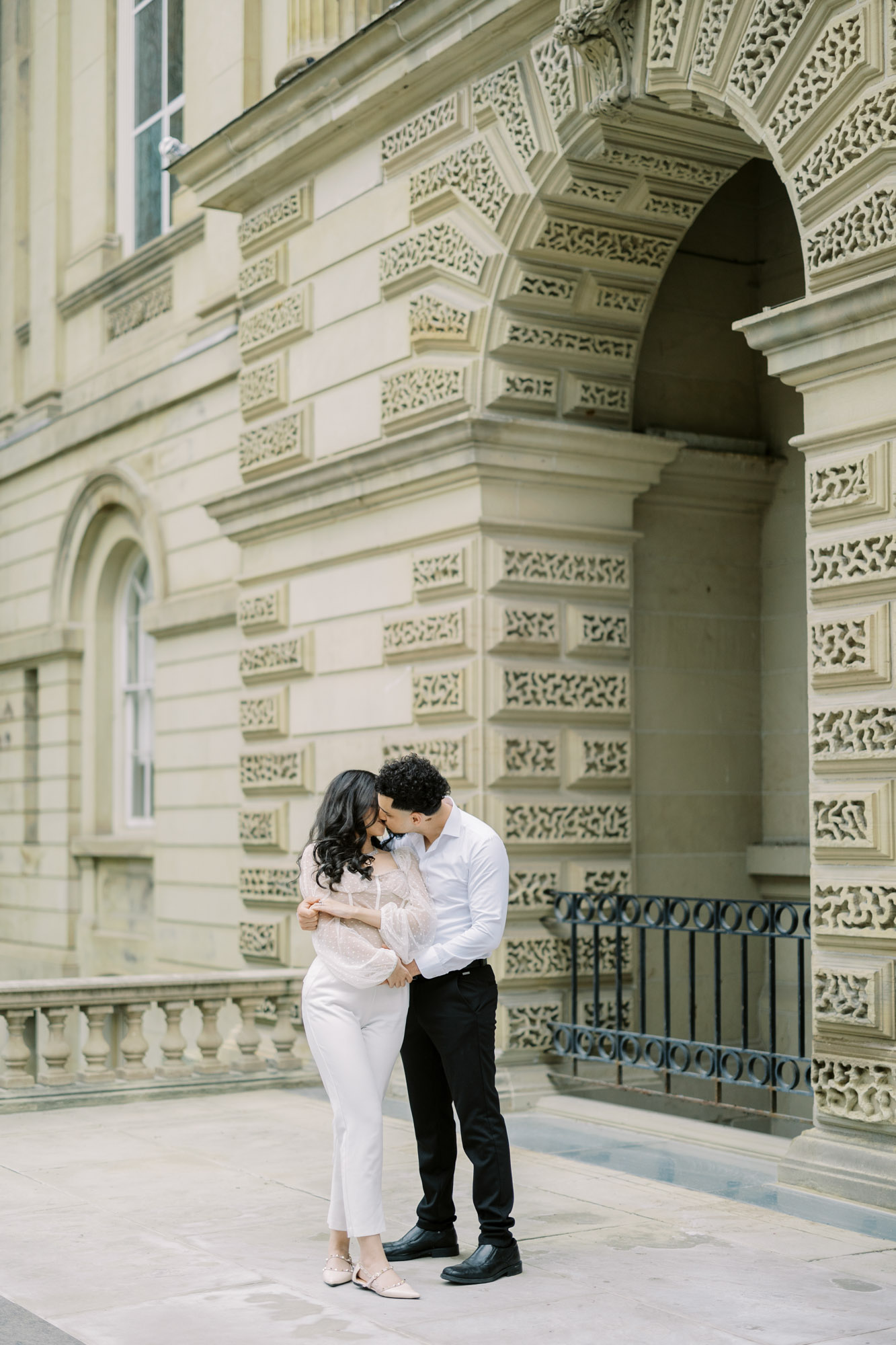 Couple kissing at Osgoode Hall Engagement Session
