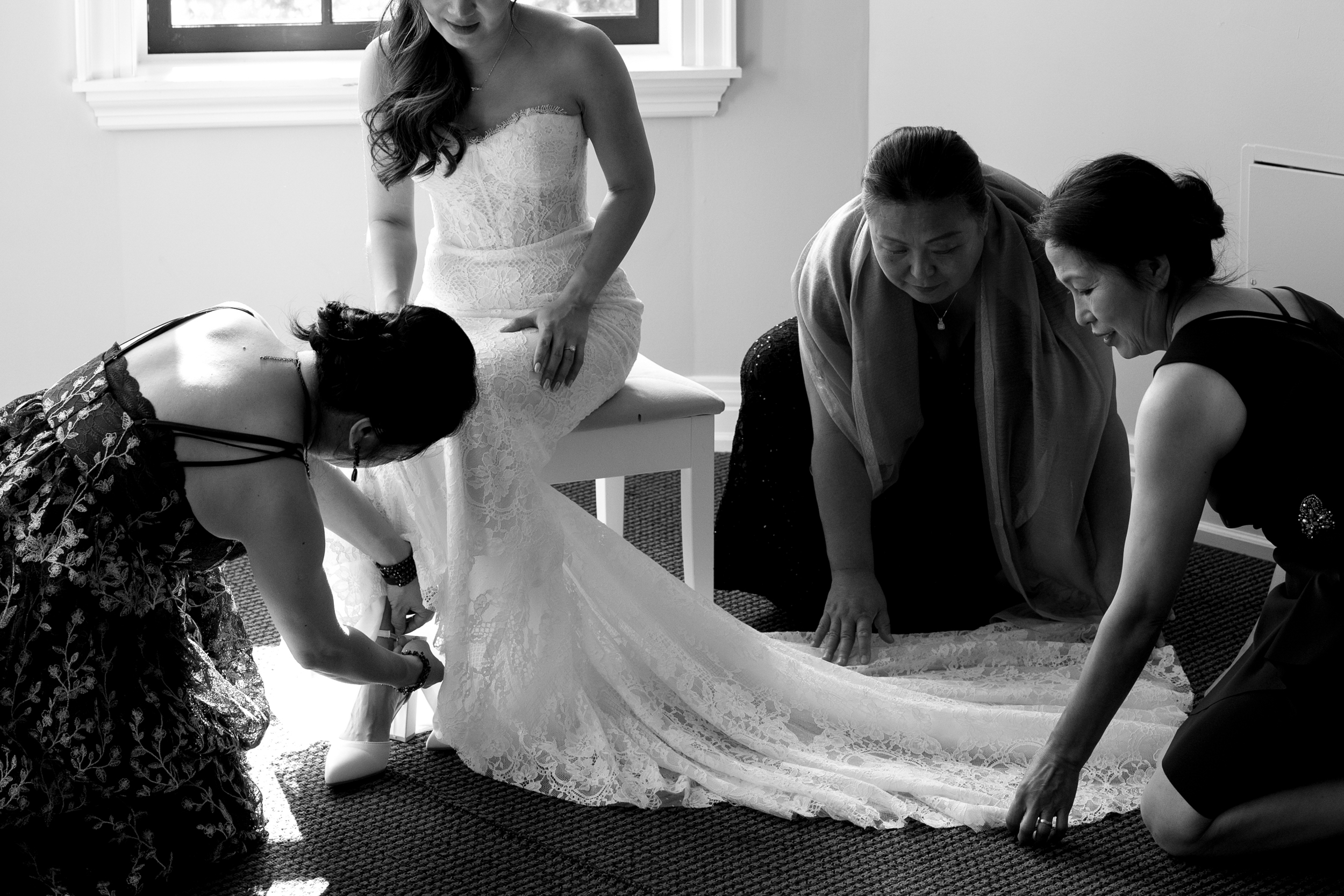 Bride getting ready with family