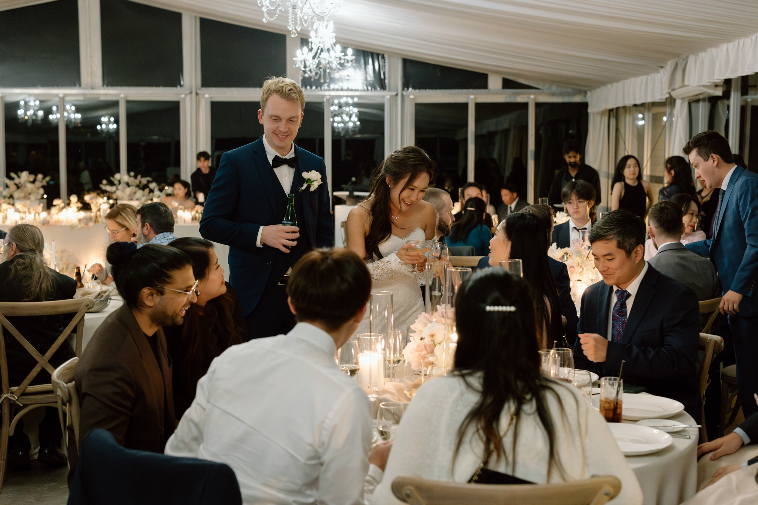Bride and groom interacting with guests at Harding Waterfront Estate